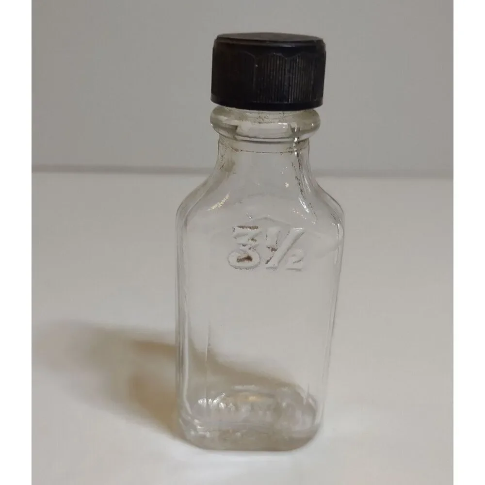 Owens Clear Glass Medicine Bottle Front Embossing 3